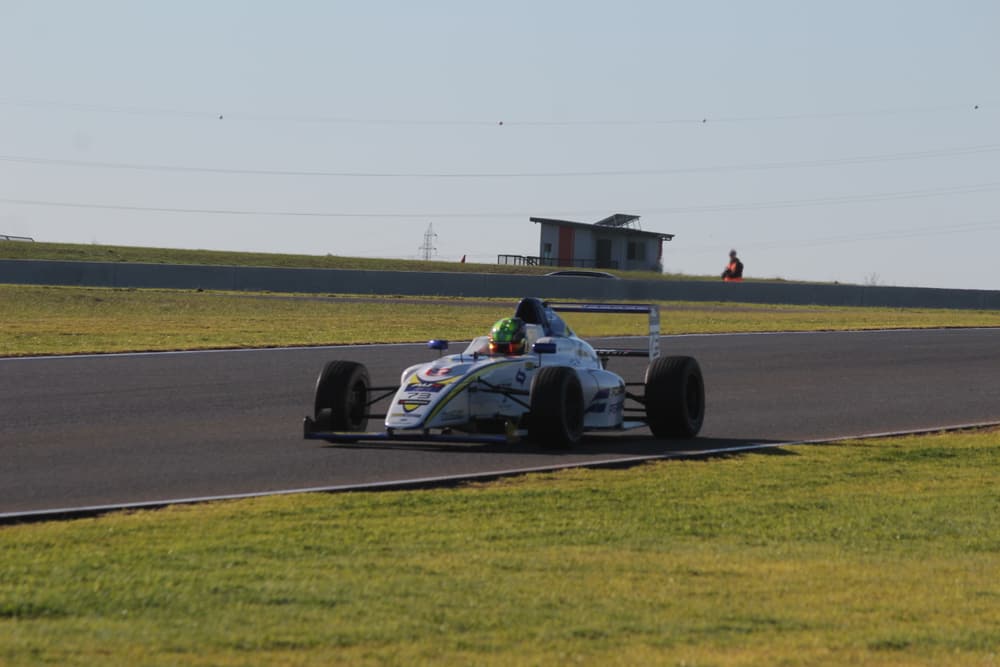 White formula car on track