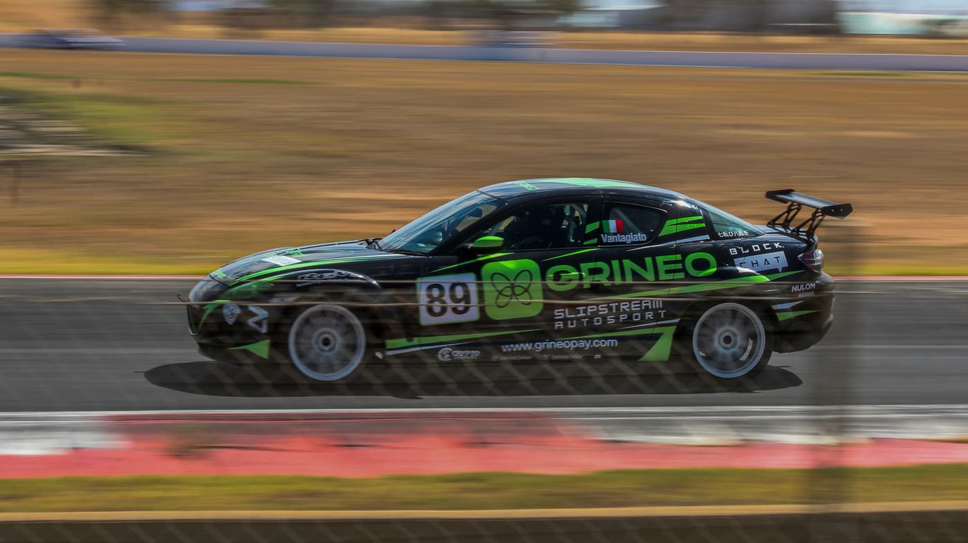 Number 89 sedan racing at speed