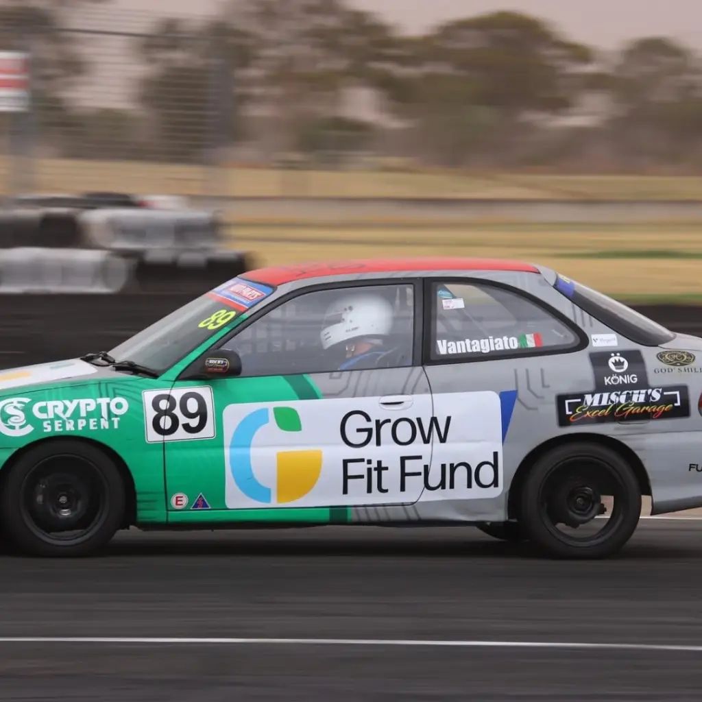 Slipstream Autosport Hyundai Excel race car at speed
